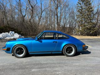 This beautiful 1976 Minerva Blue Metallic Carrera 3.0 with a Motronic, fuel-injected 964 3.6 liter engine is now on Pcarmarket being auctioned. The original, matching numbers 3.0 liter engine will be included disassembled and in boxes. #carrera30
